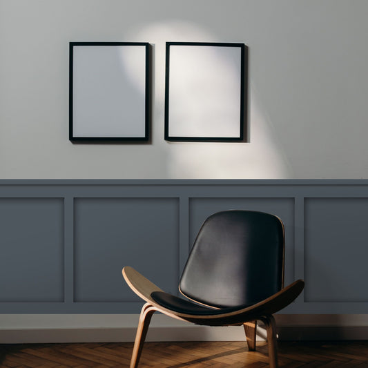 Black chair in front of modern board and batten accent wall