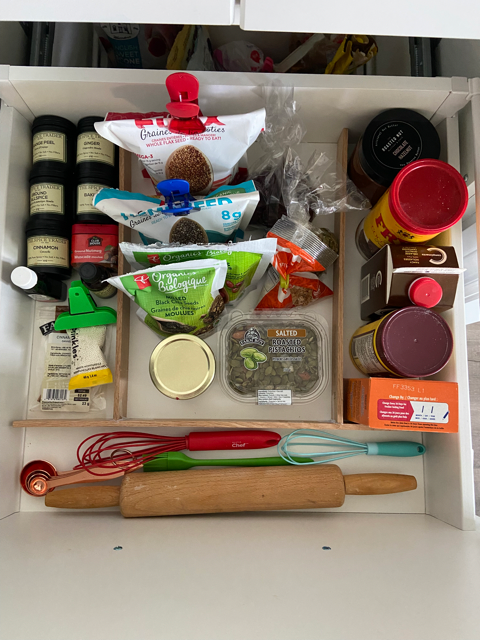 Kitchen drawer with spices and wood dividers