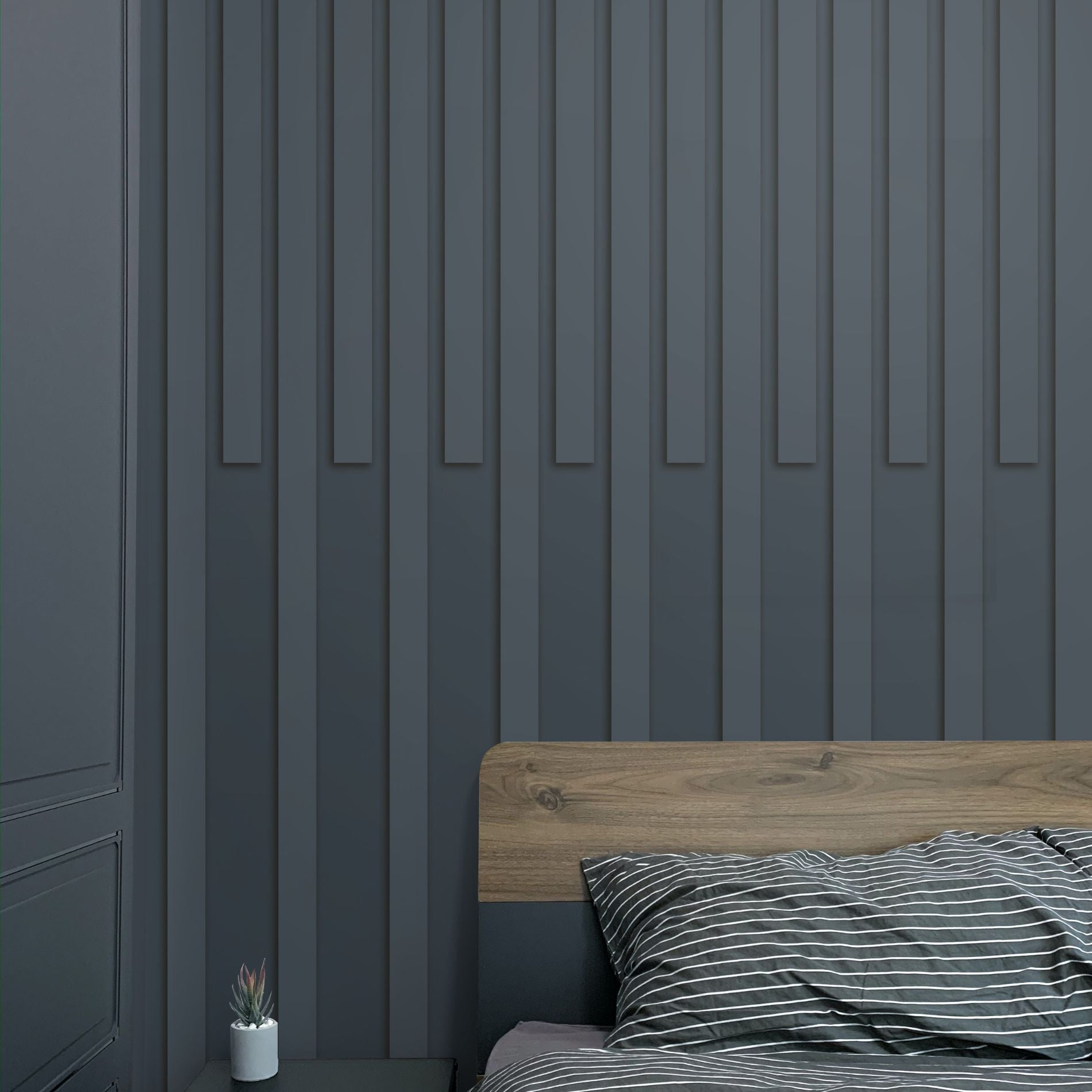 Dark decor with bed in front of alternating unique wood slat accent wall