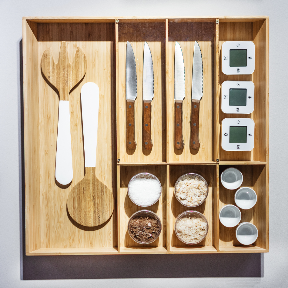 Wooden cabinet organizer with kitchen items
